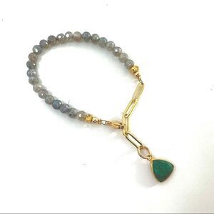 Gold paper clip chain bracelet with labradorite stones and emerald charm